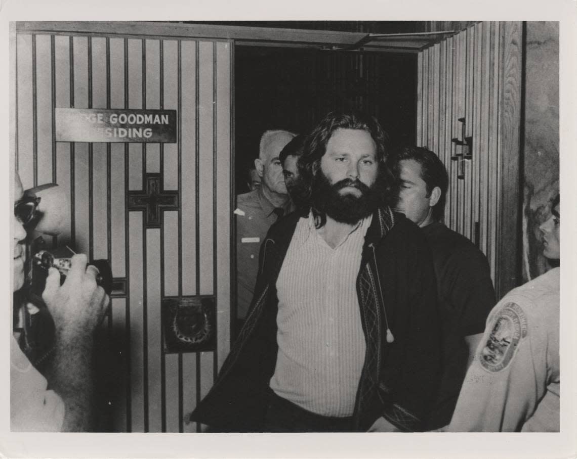 1970: Jim Morrison leaves courtroom. The lead singer of the Doors was on trial, accused of lewd and lascivious behavior, drunkenness, profanity and indecent exposure during a concert at Dinner Key Auditorium in Miami in 1969.