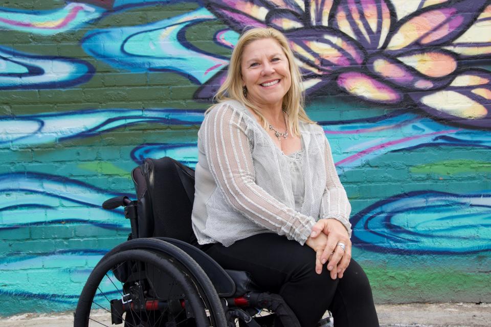 Former Ms. Wheelchair Colorado poses for a portrait at Brewability Lab on 3445 S. Broadway in Englewood.