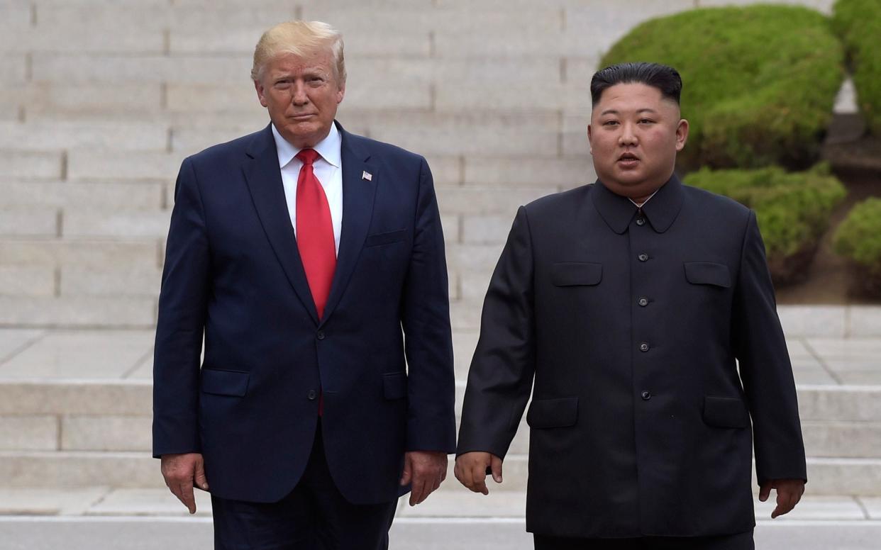 President Donald Trump meets with North Korean leader Kim Jong Un at the North Korean side of the border at the village of Panmunjom in Demilitarized Zone. - AP