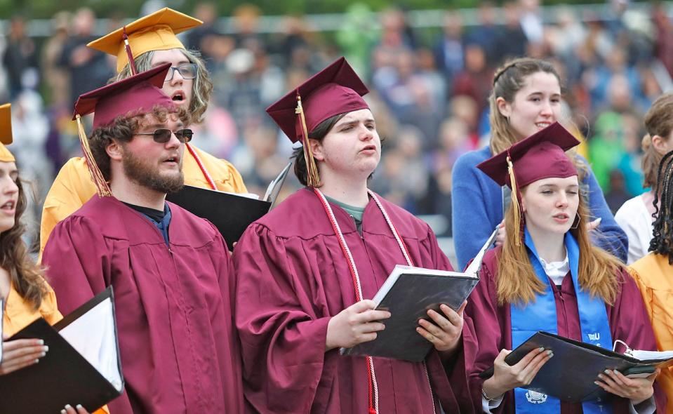 Choir members sing "Goodbye Yellow Brick Road" during Weymouth High's graduation on Saturday, June 3, 2023.