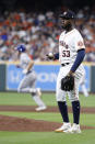 Houston Astros starting pitcher Cristian Javier reacts after giving up a two-run home run to Kansas City Royals' Hunter Dozier during the first inning of a baseball game Wednesday, July 6, 2022, in Houston. (AP Photo/Kevin M. Cox)