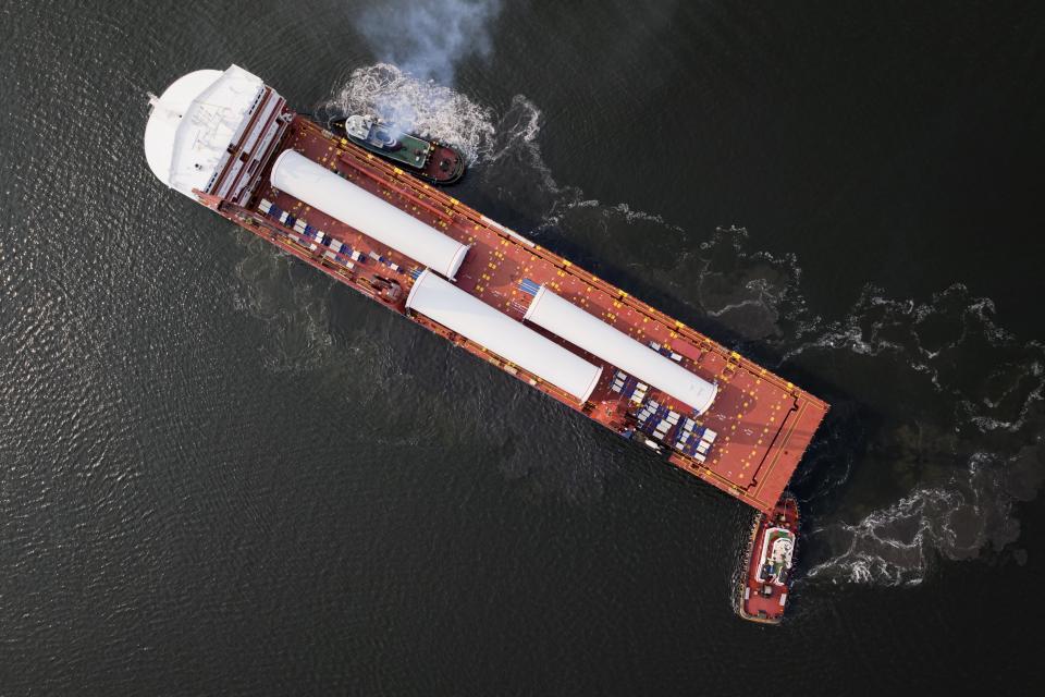 The ship UHL Felicity, carrying massive parts for offshore wind turbines, arrives to dock Wednesday, May 24, 2023, in New Bedford, Mass. Once assembled by developer Vineyard Wind, the turbines at sea will stand more than 850 feet high. (AP Photo/Rodrique Ngowi)