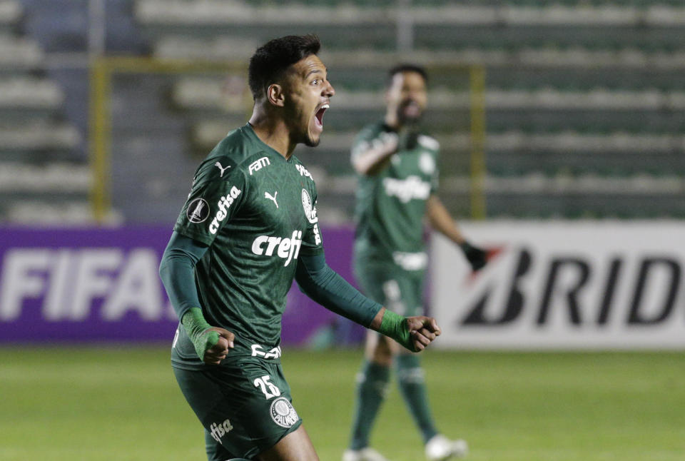 Gabriel Menino of Brazil's Palmeiras celebrates after scoring his side's 2nd goal during a Copa Libertadores soccer match against Bolivia's Bolivar in La Paz, Bolivia, Wednesday, Sept. 16, 2020. (David Mercado/Pool via AP )