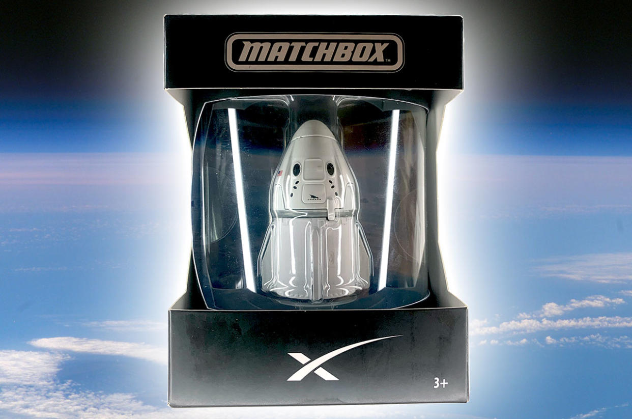  Mattel's Matchbox SpaceX Dragon Spacecraft comes packaged in a display-ready box that suspends the die-cast capsule against a backdrop of the blue Earth and blackness of space. 