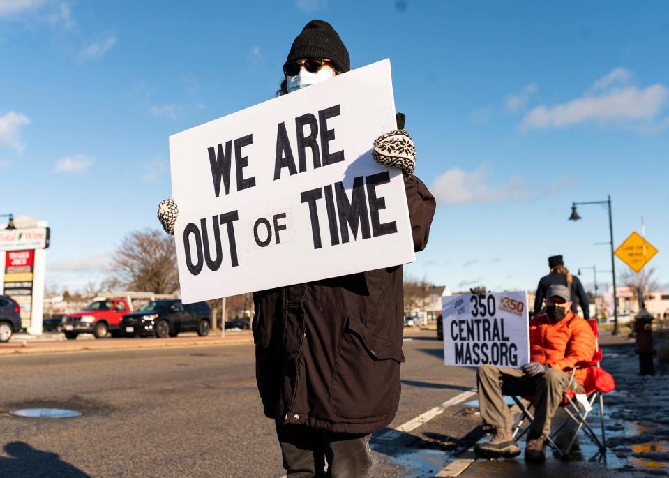 SHREWSBURY - Christina Wertz joined members of the climate advocacy group 350 Central MA at the White City Shopping Center to protest state lawmakers' failure to agree on a climate bill, Saturday, January 2, 2021. 