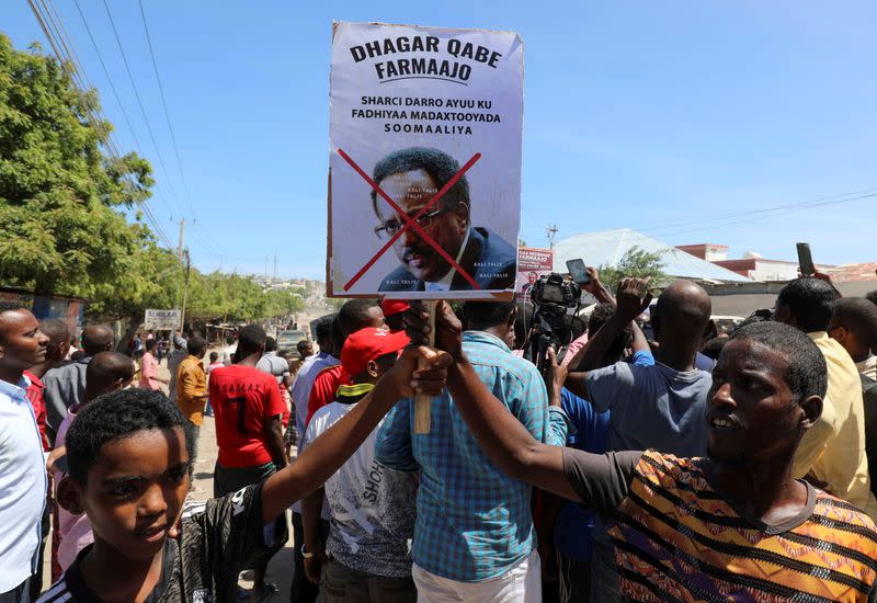 FILE PHOTO: Protesters demonstrate against Somalia's President Mohamed Abdullahi Mohamed on the streets of Yaqshid district of Mogadishu