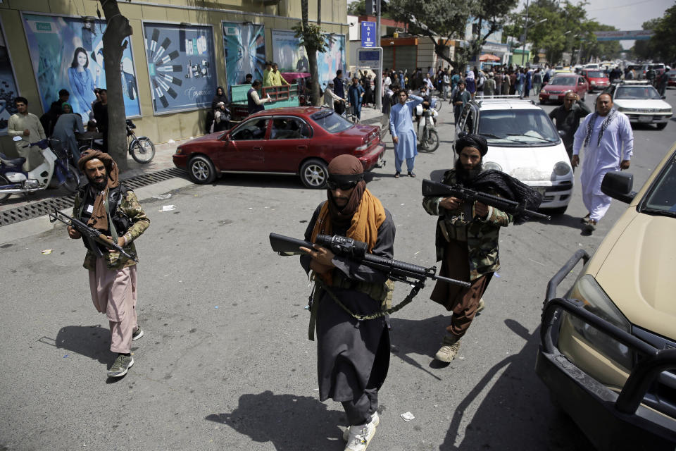 Taliban fighters patrol in Kabul, Afghanistan, Thursday, Aug. 19, 2021. The Taliban celebrated Afghanistan's Independence Day on Thursday by declaring they beat the United States, but challenges to their rule ranging from running a country severely short on cash and bureaucrats to potentially facing an armed opposition began to emerge. (AP Photo/Rahmat Gul)