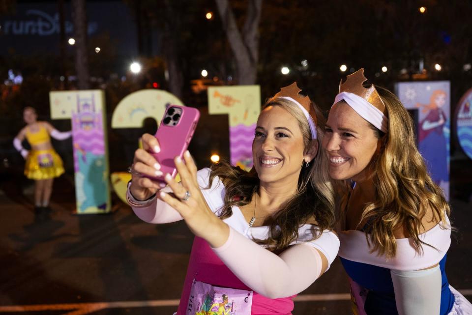 a couple of women taking a selfie