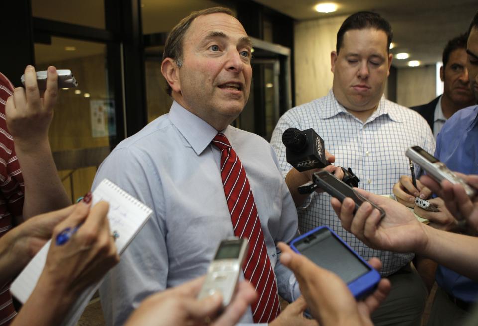 National Hockey League Commissioner Gary Bettman speaks to reporters about on going labor talks with the NHL Players Association outside the league's headquarters in New York, Tuesday, July 31, 2012. The current collective bargaining agreement ends on Sept. 15, and the NHL season is scheduled to open on Oct. 11. (AP Photo/Kathy Willens)