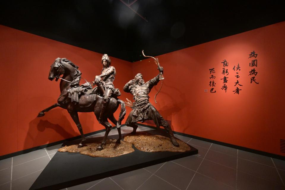 <div> <i>"A Path to Glory - Jin Yong's Centennial Memorial, Sculpted by Ren Zhe" at the Hong Kong Heritage Museum.</i> </div>