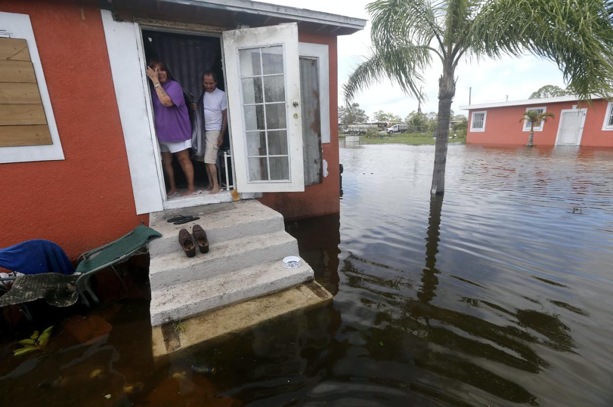 Low-income communities often have a longer wait for electricity to come back after outages. <a href="https://newsroom.ap.org/detail/457a5faae7c84a23947a3e781c5ce4a3" rel="nofollow noopener" target="_blank" data-ylk="slk:AP Photo/Gerald Herbert;elm:context_link;itc:0;sec:content-canvas" class="link ">AP Photo/Gerald Herbert</a>