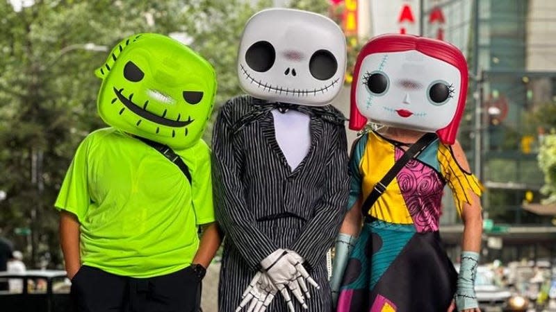 People dressed as Funko characters