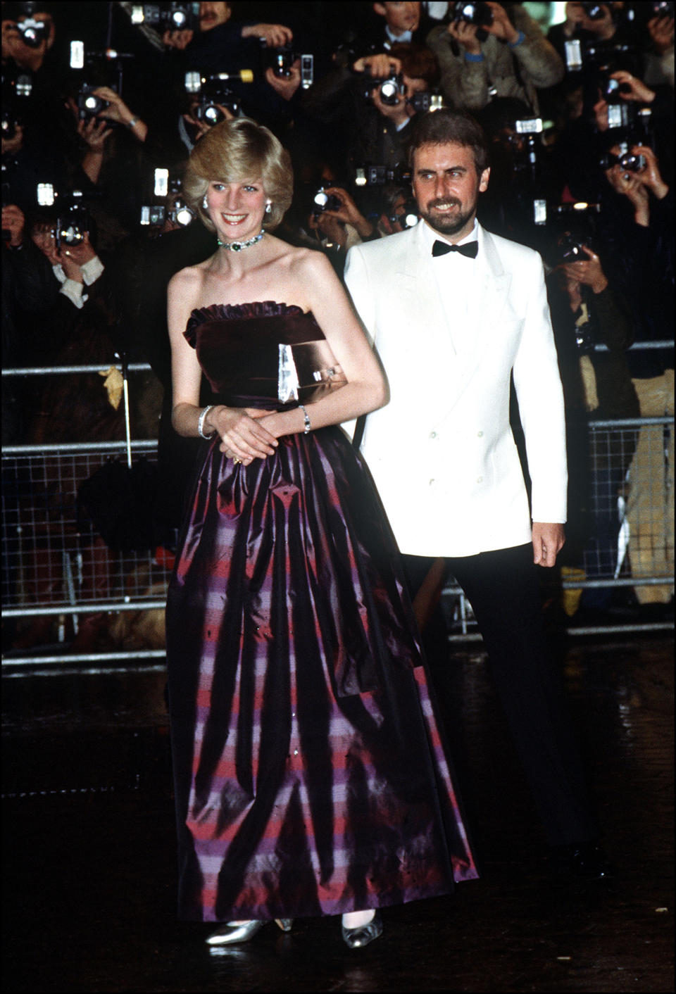 <p>A cold-shoulder Gina Frattini dress proved the perfect choice back in 1982. <em>[Photo: Getty]</em></p> 