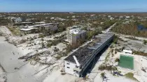 Damaged condominiums along the beachfornt after Hurricane Ian passed by the area Friday, Sept. 30, 2022, in Sanibel Island, Fla. (AP Photo/Steve Helber)