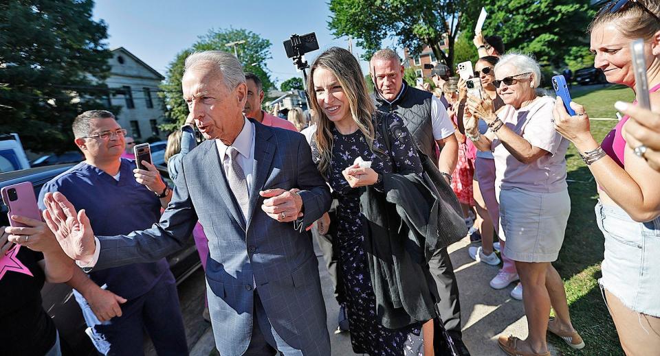 Karen Read and her father William Read walk arm in arm into Dedham Superior Court where a jury will start to deliberate the murder case against her. Hundreds of her supporters were in hand to cheer her on and hope for a not guilty finding. on Tuesday June 25, 2024