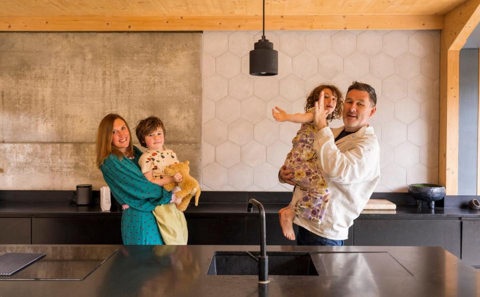 Mark and Jane Dolan with their children Sonny and Amelie in their retrofitted Victorian home in north-east London - Andrew Crowley