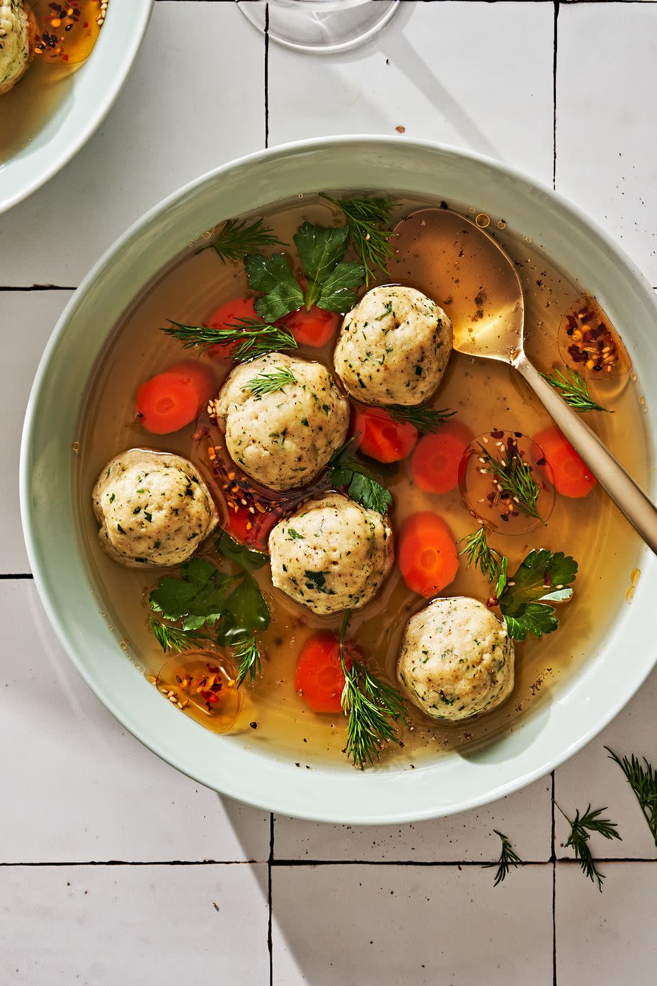 <p>Cozy and nourishing, we crave <a href="https://www.delish.com/cooking/recipe-ideas/a19473716/best-chicken-matzo-ball-soup-recipe/" rel="nofollow noopener" target="_blank" data-ylk="slk:matzo ball soup;elm:context_link;itc:0;sec:content-canvas" class="link ">matzo ball soup</a> pretty much year-round, though it's a MUST for Passover. Although schmaltz (AKA chicken fat) and <a href="https://www.delish.com/cooking/recipe-ideas/a37533215/chicken-broth-recipe/" rel="nofollow noopener" target="_blank" data-ylk="slk:chicken broth;elm:context_link;itc:0;sec:content-canvas" class="link ">chicken broth</a> are typically included in this classic Ashkenazi Jewish soup, it’s not hard to swap in vegetarian-friendly ingredients.</p><p>Get the <strong><a href="https://www.delish.com/cooking/a39355382/vegetarian-matzo-ball-soup-recipe/" rel="nofollow noopener" target="_blank" data-ylk="slk:Vegetarian Matzo Ball Soup recipe;elm:context_link;itc:0;sec:content-canvas" class="link ">Vegetarian Matzo Ball Soup recipe</a></strong>.</p>