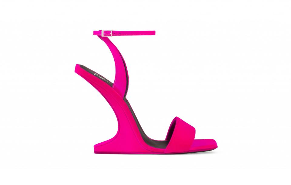 <p>Giuseppe Zanotti’s new Backstage capsule collection is a vibrant mish-mash of towering heels and comfy flats. Two styles have just been released: a hot pink architectural pair of wedges and Zanotti’s matching signature trainers. Stay tuned for the full range in September.<br><a rel="nofollow noopener" href="https://www.giuseppezanottidesign.com/uk/woman/collection/miss-unfinished" target="_blank" data-ylk="slk:Giuseppe Zanotti, from £695;elm:context_link;itc:0;sec:content-canvas" class="link "><em>Giuseppe Zanotti, from £695</em></a> </p>