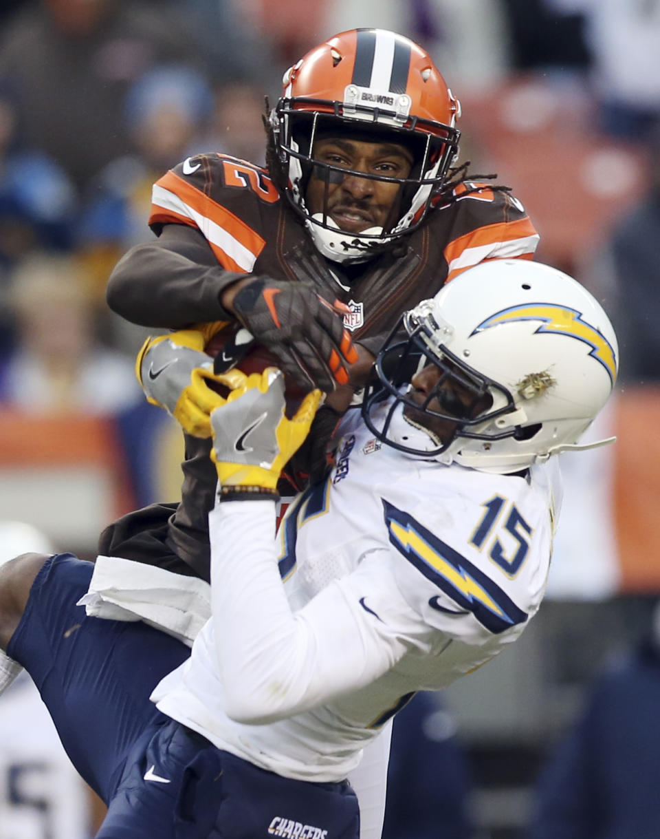 San Diego Chargers wide receiver Dontrelle Inman (15) cannot hold onto a pass under pressure from Cleveland Browns cornerback Tramon Williams (22) in the second half of an NFL football game, Saturday, Dec. 24, 2016, in Cleveland. (AP Photo/Aaron Josefczyk)