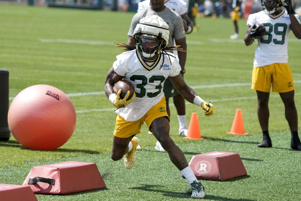 Green Bay Packers' Aaron Jones runs during NFL football training camp Thursday, July 27, 2023, in Green Bay, Wis. (AP Photo/Morry Gash)