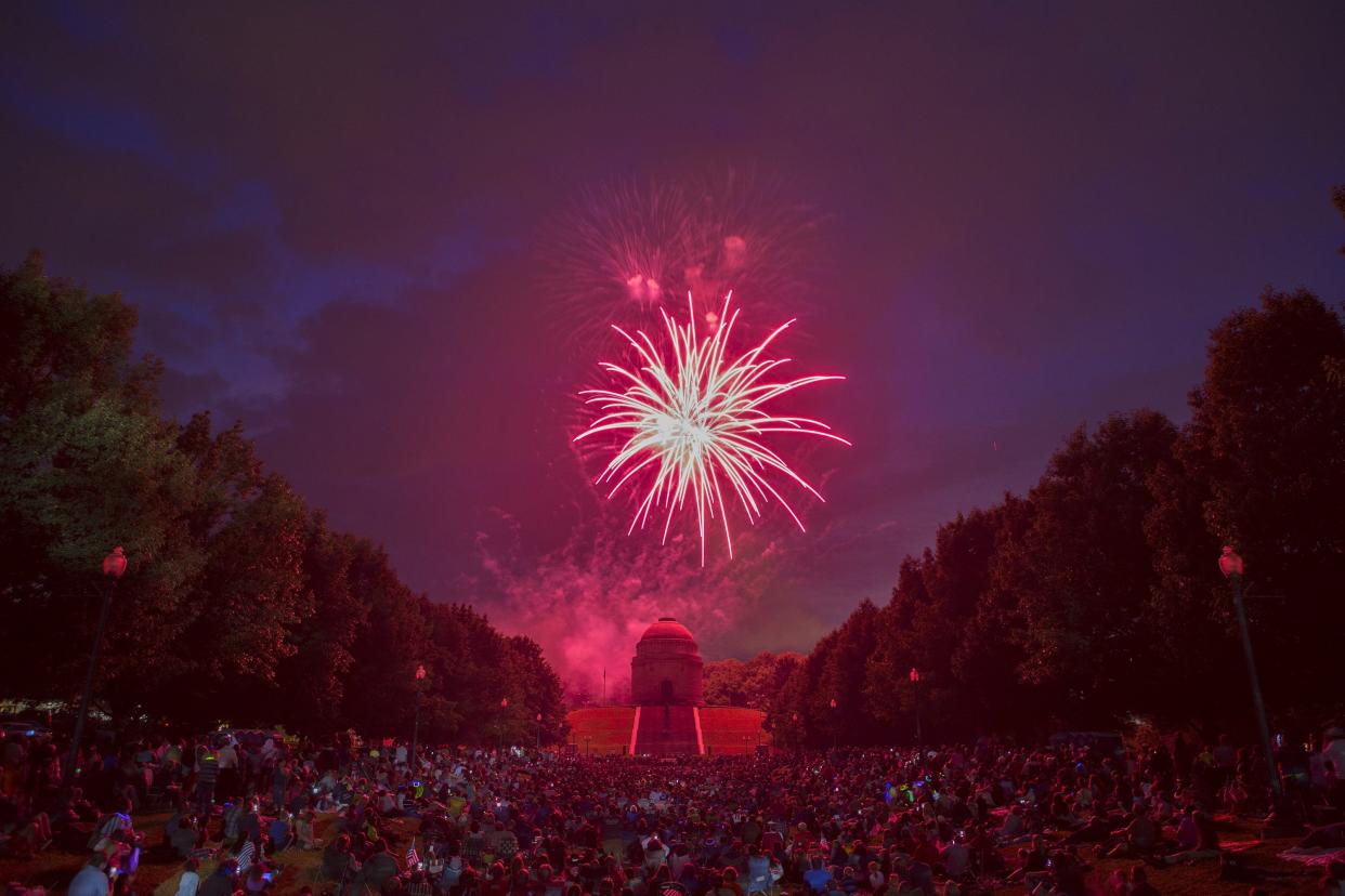 Fireworks are set off during Canton's Monumental Fourth Celebration at the Wm. McKinley Presidential Library and Museum on July 3, 2016. (Canton Repository/Bob Rossiter)