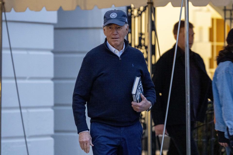 President Joe Biden walks towards members of the media before boarding Marine One on the South Lawn of the White House in Washington, Friday, March 1, 2024, to travel to Camp David, Md., for the weekend. (AP Photo/Andrew Harnik)