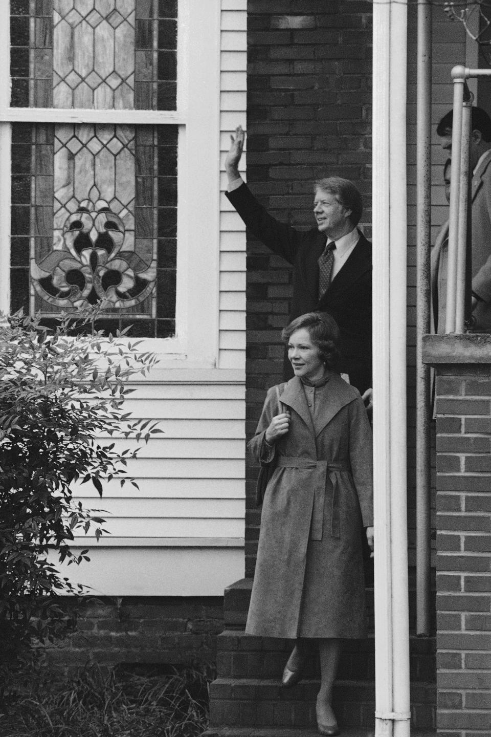 President Jimmy Carter and his wife Rosalynn leave the First Baptist Church in Plains, Georgia Dec. 26, 1977 where they attended Sunday School. They then attended Christmas services at the Maranatha Baptist Church a few miles outside the President's hometown. (AP Photo)