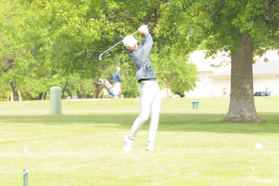 Sacred Heart's Nate Elmore tees off during the Class 2A state golf championships Monday, May 23 2022 at Emporia Municipal Golf Course.