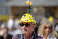 A 5-Star movement supporter wears an helmet with gadgets during a gathering in Rimini, Italy, September 23, 2017. REUTERS/Max Rossi