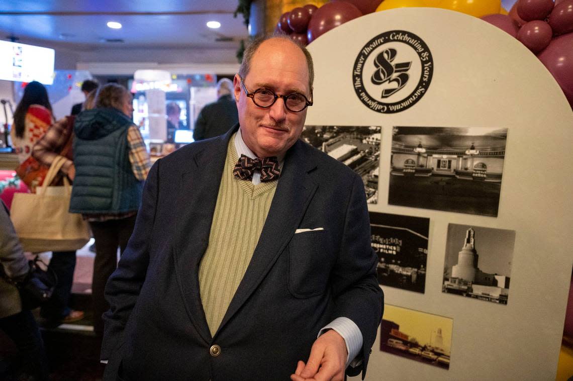 Film historian Matías Bombal stands in the lobby of the Tower Theatre on Saturday, Dec. 2, 2023, during its 85th Anniversary celebration event. Bombal gave a brief overview of the history of the theater before a screening of of the 1988 drama “Cinema Paradiso.”