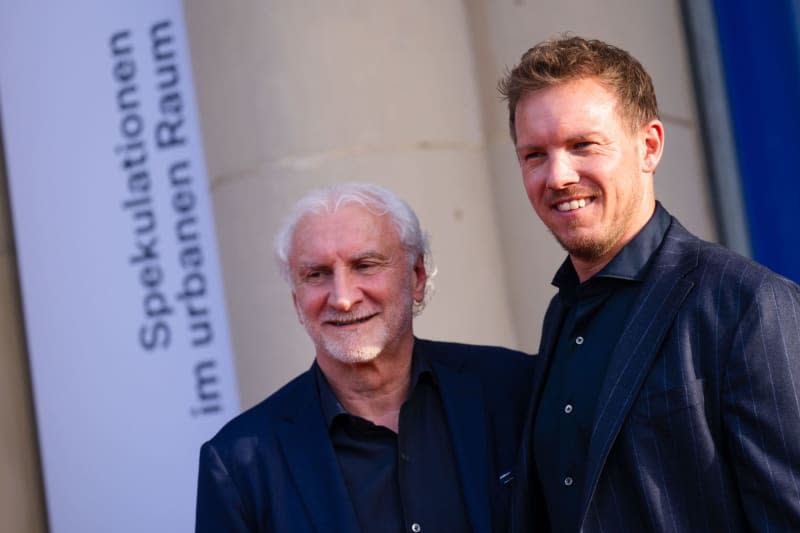 DFB sports director Rudi Voeller (L) and Germany national coach Julian Nagelsmann attend a dinner as part of the European Championship workshop for national coaches in the Standehaus. Marius Becker/dpa