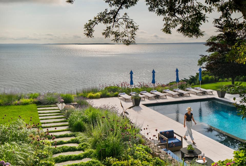 Set high atop a bluff overlooking the Peconic Bay on the North Fork of Long Island, a pre-existing pool and surround were completely renovated by Marshall Paetzel Landscape Architecture. Several mature trees were carefully protected during the construction process and help anchor the pool area into the surrounding landscape.
