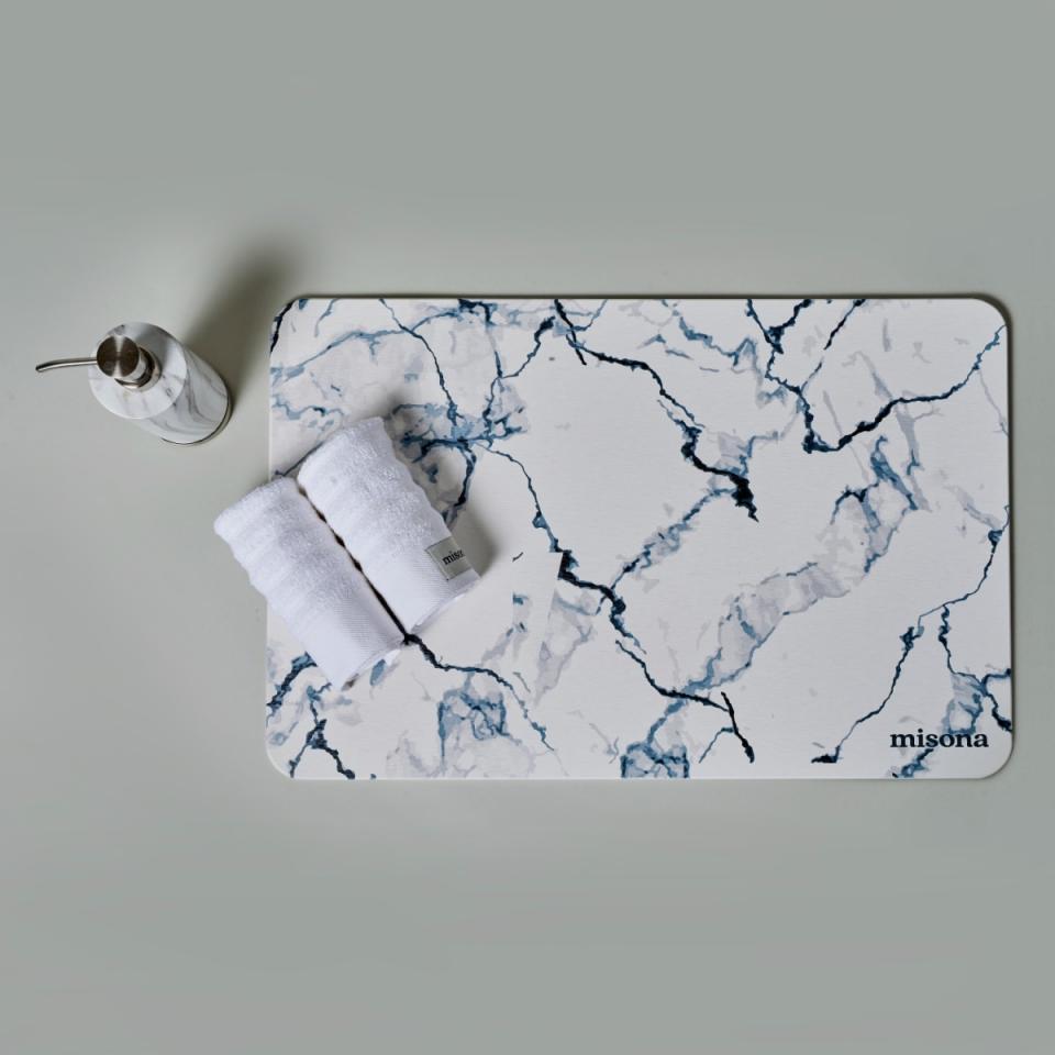 <p><a href="https://go.redirectingat.com?id=74968X1596630&url=https%3A%2F%2Fwww.wolfandbadger.com%2Fus%2Fdiatomite-bath-mat-white-marble%2F&sref=https%3A%2F%2Fwww.cosmopolitan.com%2Flifestyle%2Fg45399606%2Fstone-bath-mats%2F" rel="nofollow noopener" target="_blank" data-ylk="slk:Shop Now;elm:context_link;itc:0;sec:content-canvas" class="link ">Shop Now</a></p><p>Diatomite Bath Mat</p><p>wolfandbadger.com</p><p>$70.00</p>