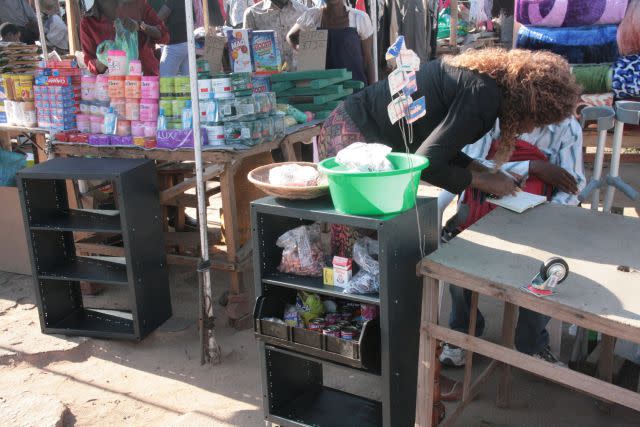 Street vendors in Harare with new display shelves. <span class="inline-image-credit">(Studio [D] Tale)</span>