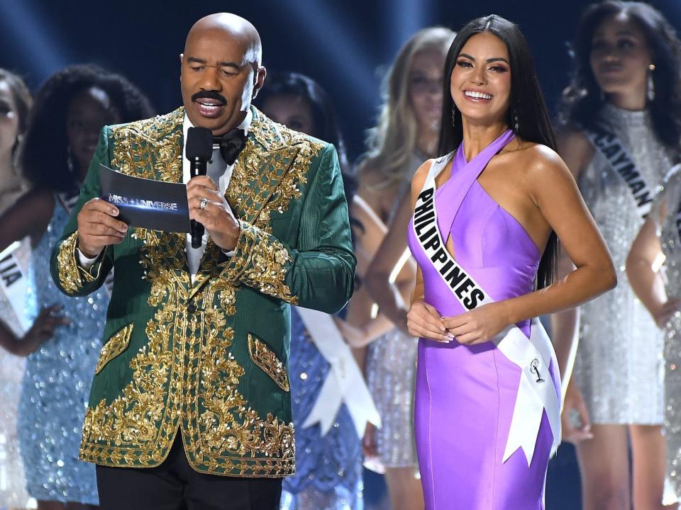 Steve Harvey and Miss Philippines at the 2019 Miss Universe pageant.