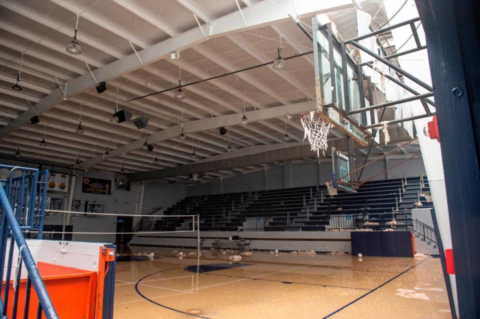 Rain falls into the gymnasium at Moss Point High School in Moss Point on Tuesday, June 20, 2023 after a tornado that struck the town Wednesday tore off part of the roof.