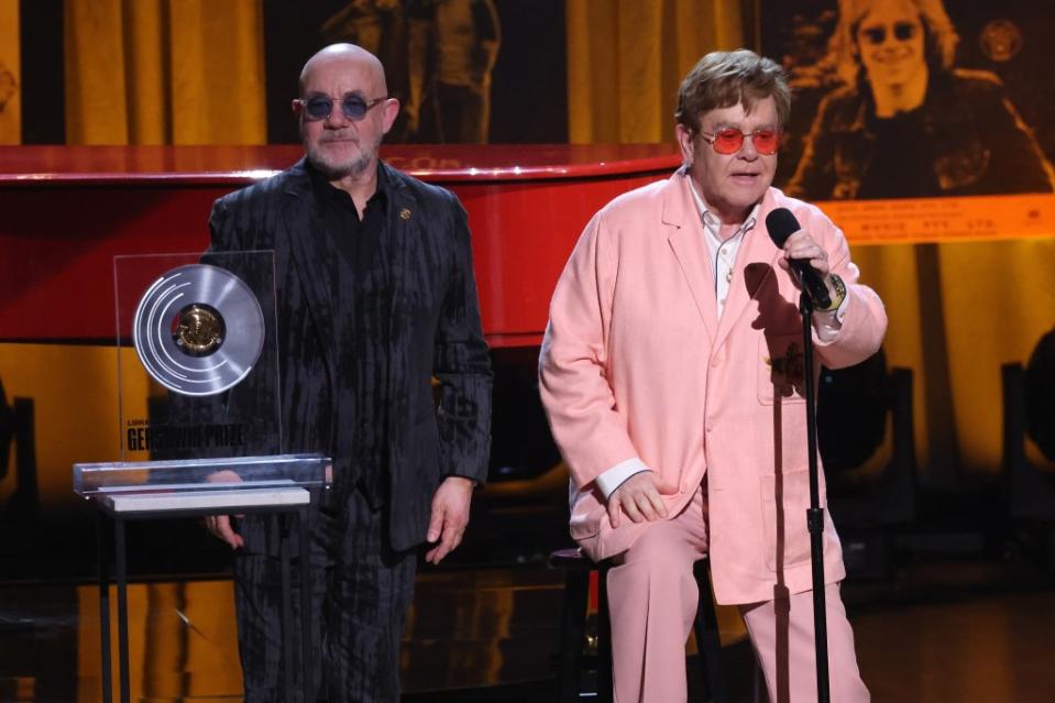 The award for the duo comes after the “Tiny Dancer” singer (right) achieved EGOT (Emmy, Grammy, Oscar and Tony) status this year after winning an Emmy Award for Best Variety Special for his Disney+ show “Elton John Live: Farewell From Dodger Stadium.” Taylor Hill/WireImage