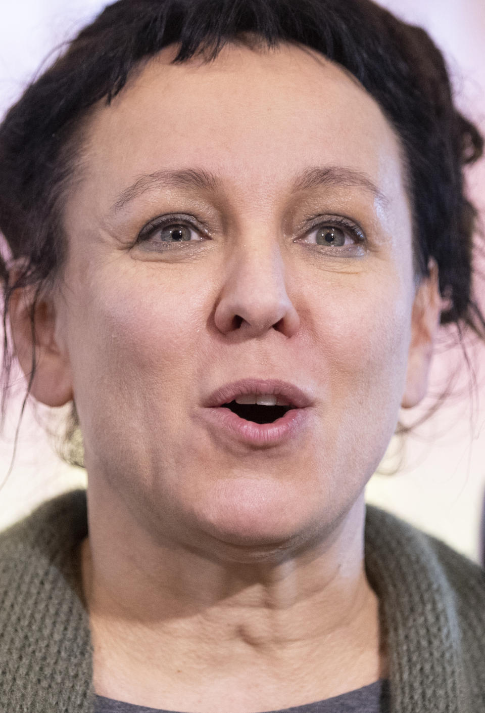 Polish author Olga Tokarczuk attends a press conference in Bielefeld, Germany, Thursday, Oct 10, 2019. Olga Tokarczuk is named recipient of the 2018 Nobel Prize in Literature, Thursday Oct. 10, 2019. Two Nobel Prizes in literature are announced Thursday after the 2018 literature award was postponed following sex abuse allegations that rocked the Swedish Academy at that time. (Friso Gentsch/dpa via AP)