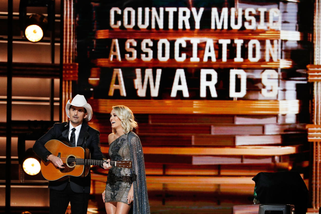 Brad Paisley and Carrie Underwood appear onstage at the 2016 CMA Awards. (Photo: Taylor Hill via Getty Images)