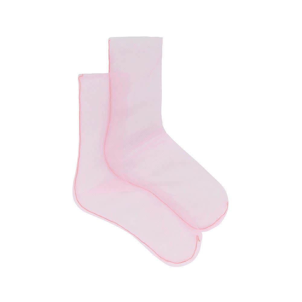 <p><a href="https://go.redirectingat.com?id=74968X1596630&url=https%3A%2F%2Fwww.revolve.com%2Ffree-people-the-moment-sheer-socks-in-pink%2Fdp%2FFREE-WA161%2F%3Fd%3DWomens%26sectionURL%3DDirect%2BHit%26code%3DFREE-WA161%26srcType%3Ddp_coloroption&sref=https%3A%2F%2F" rel="nofollow noopener" target="_blank" data-ylk="slk:Shop Now;elm:context_link;itc:0;sec:content-canvas" class="link rapid-noclick-resp">Shop Now</a></p><p>The Moment transparent Socks</p><p>$14.00</p>