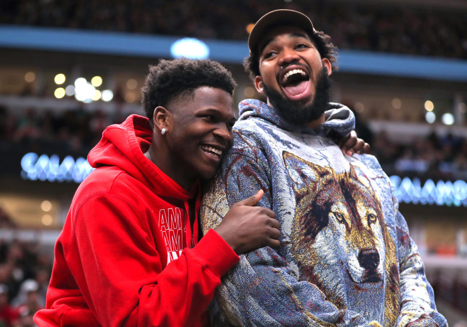 CHICAGO, IL - MARCH 17: Minnesota Timberwolves guard Anthony Edwards (1) and Minnesota Timberwolves center Karl-Anthony Towns (32) react on the bench during a NBA game between the Minnesota Timberwolves and the Chicago Bulls on March 17, 2023 at the United Center in Chicago, IL. (Photo by Melissa Tamez/Icon Sportswire via Getty Images)