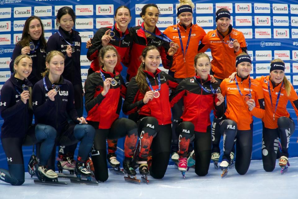 In this file photo, Florence Brunelle, Renée Steege, Courtney Sarault, Rikki Doak, and Danae Blais show their medals at Short Track Speed Skating World Cup Montreal with the American and Dutch teams on October 22, 2023.