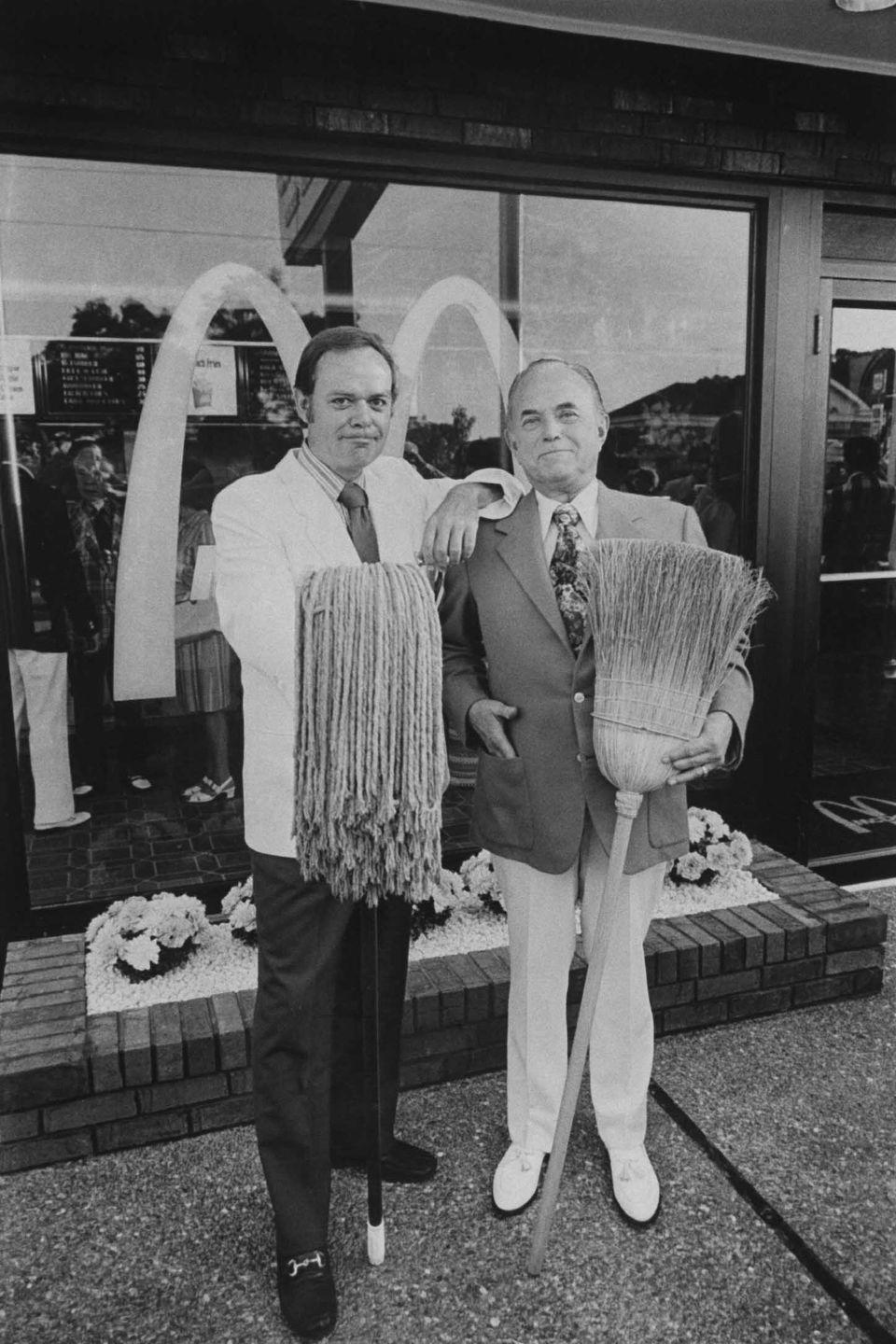 <p>President Frederick Turner and CEO Raymond Kroc posing in celebration of the opening of McDonald's 2,500th location, which was located in a suburban shopping center in Hickory Hills, Illinois. Not sure why they're holding a broom and mop, but OK!</p>
