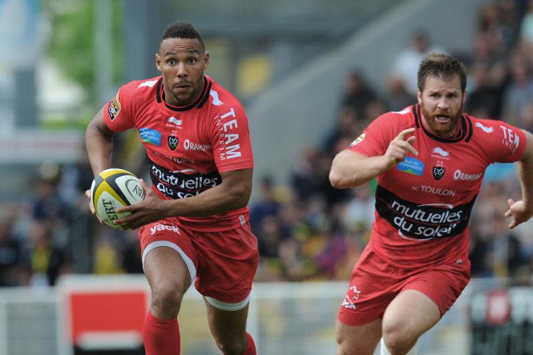 Toulon's New Zealand wing Rudi Wulf (L) and South African hooker Graig Burden are pictured in action during the French Top 14 rugby union match La Rochelle vs Toulon on April 25, 2015 in La Rochelle, western France