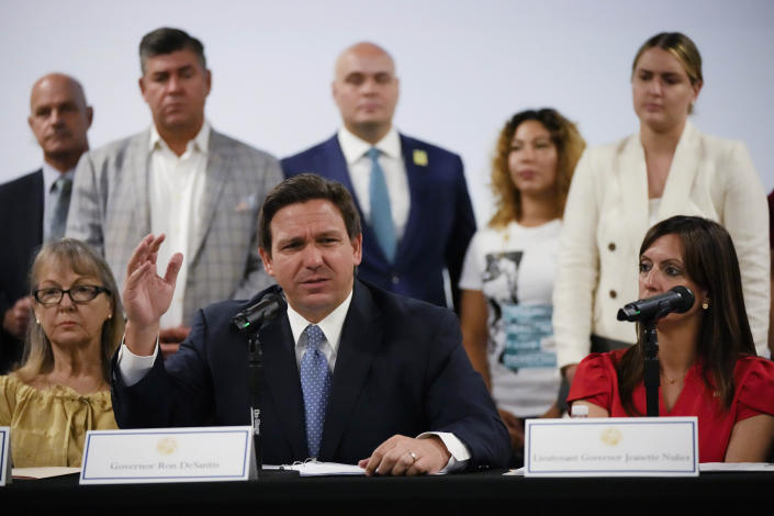 Florida Gov. Ron DeSantis speaks to journalists following a round table on Cuba, Tuesday, July 13, 2021, at the American Museum of the Cuban Diaspora in Miami. (AP Photo/Rebecca Blackwell)