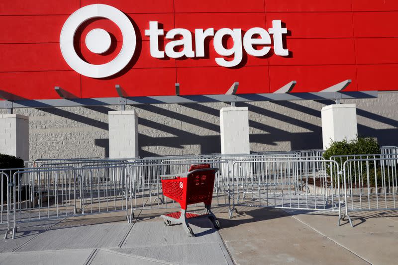 FILE PHOTO: An empty shopping cart stands outside a target store during a Black Friday sales event in Westbury, New York