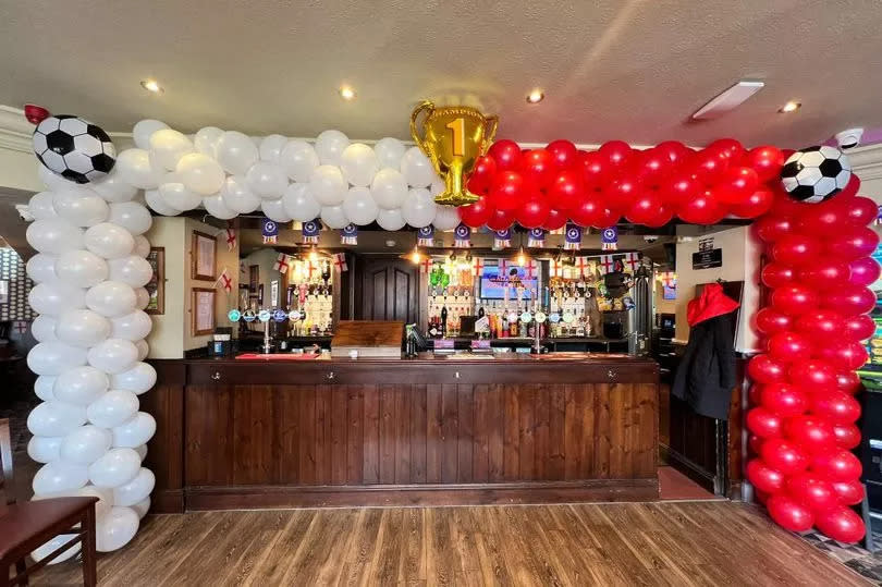 Pub managers Andrew Werra and Kirsten Collinson like to go to town dressing up The Cross Keys pub for sporting occasions, with balloon arches, bunting and more