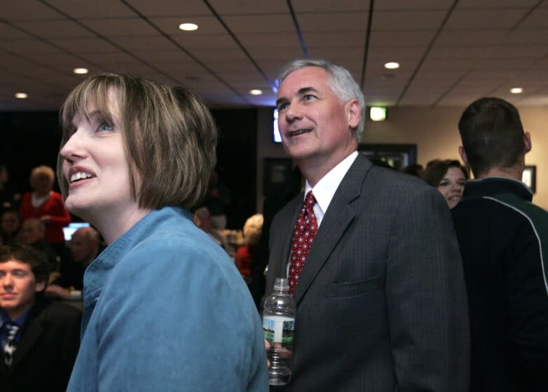 State Sen. Tom McClintock, the Republican candidate for the 4th Congressional District, and his wife, Lori, left, smile as they watch election returns are posted at his election night party in Roseville, Calif., Tuesday, Nov. 4, 2008. McClintock is in a tight race against Democrat Charlie Brown.(AP Photo/Rich Pedroncelli)