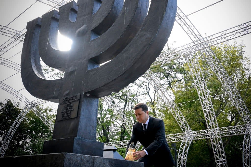 Ukraine president Volodymyr Zelensky laying down a lamp at the Minora memorial in Kiev, to mark the 80th anniversary of the Babi Yar massacre (Ukraine Presidency/AFP/Getty)