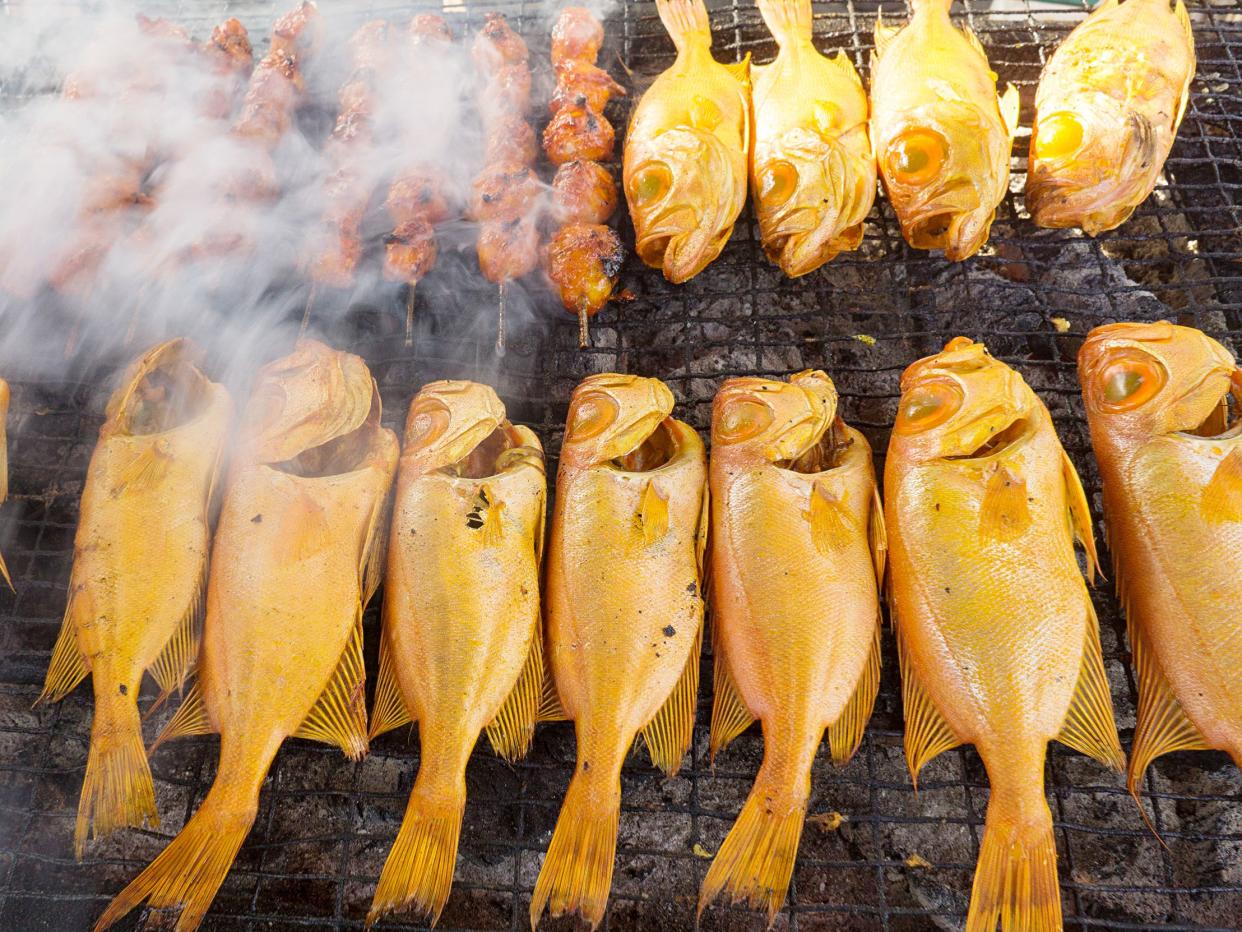 Famous Sabah North Borneo grilled fish street food called "ikan merah bakar"